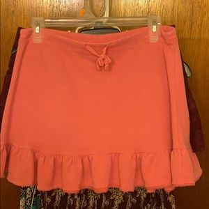 Coral color skirt,with cute ruffle at the bottom